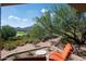 Relaxing patio with stunning mountain views and comfortable seating at 10626 E Palo Brea Dr, Scottsdale, AZ 85262