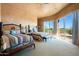 Two twin beds in a bedroom with access to balcony at 10626 E Palo Brea Dr, Scottsdale, AZ 85262