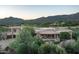 Luxury estate with pool, spa, and mountain backdrop at 10626 E Palo Brea Dr, Scottsdale, AZ 85262