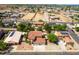 Two-story house with a three-car garage and solar panels at 161 N Silverwood Dr, Casa Grande, AZ 85122