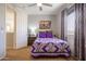 Cozy bedroom with double bed, nightstand, and ceiling fan at 161 N Silverwood Dr, Casa Grande, AZ 85122