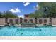 Stunning pool with decorative waterfall feature at 161 N Silverwood Dr, Casa Grande, AZ 85122