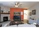 Bright living room with fireplace and built-in shelving at 161 N Silverwood Dr, Casa Grande, AZ 85122