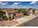 Two-story house with a three-car garage and desert landscaping at 161 N Silverwood Dr, Casa Grande, AZ 85122