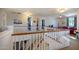 Upstairs loft area with built-in seating and views to the main floor at 161 N Silverwood Dr, Casa Grande, AZ 85122