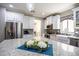 Granite kitchen island with seating for four at 161 N Silverwood Dr, Casa Grande, AZ 85122