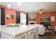 Open kitchen with island that overlooks living room at 161 N Silverwood Dr, Casa Grande, AZ 85122