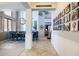 An inviting entryway with high ceilings, a view into the dining area, and a stylish photo gallery at 161 N Silverwood Dr, Casa Grande, AZ 85122