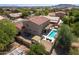 Two-story house with a pool and a large backyard at 161 N Silverwood Dr, Casa Grande, AZ 85122