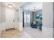 A bright entryway with tiled floors, white door, and a cozy sitting area at 161 N Silverwood Dr, Casa Grande, AZ 85122