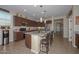 Updated kitchen featuring stainless steel appliances and an island with seating at 12380 N 144Th N Dr, Surprise, AZ 85379