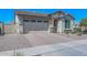 Single-story home with a two-car garage at 12380 N 144Th N Dr, Surprise, AZ 85379