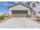 Two story house with attached garage and landscaping at 36545 N Herens Rd, San Tan Valley, AZ 85143