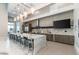 Modern community kitchen with large island and bar seating at 5250 E Deer Valley Dr # 406, Phoenix, AZ 85054