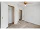 Simple bedroom with ceiling fan and closet at 535 S Alma School Rd # 45, Mesa, AZ 85210