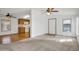 Living room with adjacent kitchen and hardwood floors at 535 S Alma School Rd # 45, Mesa, AZ 85210