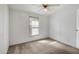 Bright bedroom with neutral carpeting and a window with blinds at 535 S Alma School Rd # 45, Mesa, AZ 85210