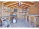 Well-equipped workshop with shelves and workbench at 535 S Alma School Rd # 45, Mesa, AZ 85210