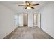 Bright bedroom with ceiling fan and access to closets and bathroom at 535 S Alma School Rd # 45, Mesa, AZ 85210