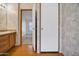 Bathroom with vanity, linen closet, and bedroom access at 535 S Alma School Rd # 45, Mesa, AZ 85210