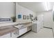 Community laundry room with washer, dryer, and sink at 535 S Alma School Rd # 45, Mesa, AZ 85210