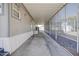 Concrete walkway with mesh side and exterior storage at 535 S Alma School Rd # 45, Mesa, AZ 85210
