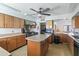 Well-equipped community kitchen with island and ample cabinetry at 535 S Alma School Rd # 45, Mesa, AZ 85210