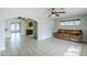 Bright and airy living room with tile floors, a ceiling fan, and access to other living spaces at 2124 E Osborn Rd, Phoenix, AZ 85016