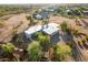 Aerial view showcasing a house and surrounding desert landscape at 4532 E Superstition Blvd, Apache Junction, AZ 85119