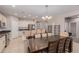 Modern kitchen with island and stainless steel appliances at 17986 W Fulton St, Goodyear, AZ 85338