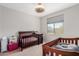 Bedroom with crib and changing table at 17986 W Fulton St, Goodyear, AZ 85338