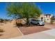 Landscaped front yard with a driveway at 17986 W Fulton St, Goodyear, AZ 85338