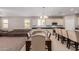 Open concept dining room with kitchen and living room views at 17986 W Fulton St, Goodyear, AZ 85338