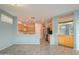 Open kitchen with light wood cabinets and breakfast bar at 17621 N Eagle Crest Dr, Surprise, AZ 85374
