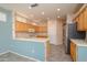 Eat-in kitchen with stainless steel appliances and an island at 17621 N Eagle Crest Dr, Surprise, AZ 85374