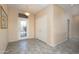 Bright and spacious entryway with tile flooring and double-door closet at 17621 N Eagle Crest Dr, Surprise, AZ 85374