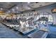 State-of-the-art fitness center with numerous treadmills and cardio equipment at 12820 W La Vina Dr, Sun City West, AZ 85375