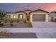 Charming one-story home with gray exterior and landscaped front yard at 4145 S Zephyr --, Mesa, AZ 85212