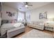 Bedroom with a comfy sitting area and large windows at 12290 E Gold Dust Ave, Scottsdale, AZ 85259