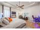 Main bedroom with sitting area and large TV at 12290 E Gold Dust Ave, Scottsdale, AZ 85259