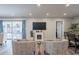Living room with fireplace and access to backyard at 6514 N 85Th Pl, Scottsdale, AZ 85250