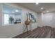 Bright entryway with wood-look flooring and a view into an office at 6514 N 85Th Pl, Scottsdale, AZ 85250