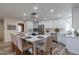 Modern kitchen with white cabinets, island, and stainless steel appliances at 6514 N 85Th Pl, Scottsdale, AZ 85250