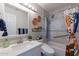 Updated bathroom features a walk-in shower and modern vanity at 6514 N 85Th Pl, Scottsdale, AZ 85250