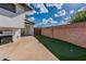 Backyard with putting green, patio, and built-in grill at 6514 N 85Th Pl, Scottsdale, AZ 85250
