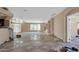 Spacious living room with tile flooring and needs updating at 3718 S 379Th Ave, Tonopah, AZ 85354