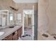 Main bathroom with double sinks and a view into another room needing renovation at 3718 S 379Th Ave, Tonopah, AZ 85354