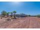 House exterior showing a large yard and desert landscaping at 3718 S 379Th Ave, Tonopah, AZ 85354