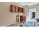 Kitchen with wood cabinets and a small sink needing renovation at 3718 S 379Th Ave, Tonopah, AZ 85354