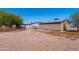 Backyard with detached garage and landscaping at 3718 S 379Th Ave, Tonopah, AZ 85354